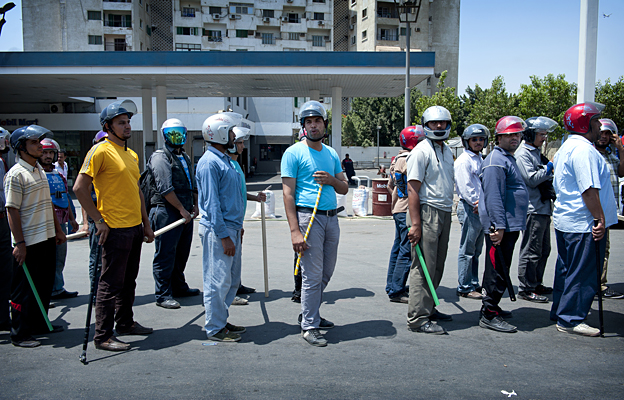 Protesters in helmets